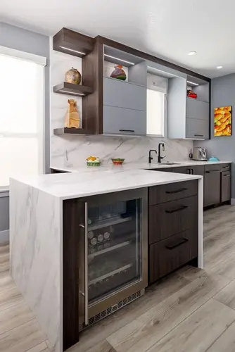 Beautifully remodeled kitchen in Vero Beach by Final Touch Kitchen & Bath Design, featuring custom cabinetry and modern finishes