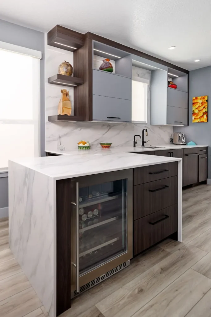 Modern Vero Beach kitchen with marble countertops and wood cabinetry design