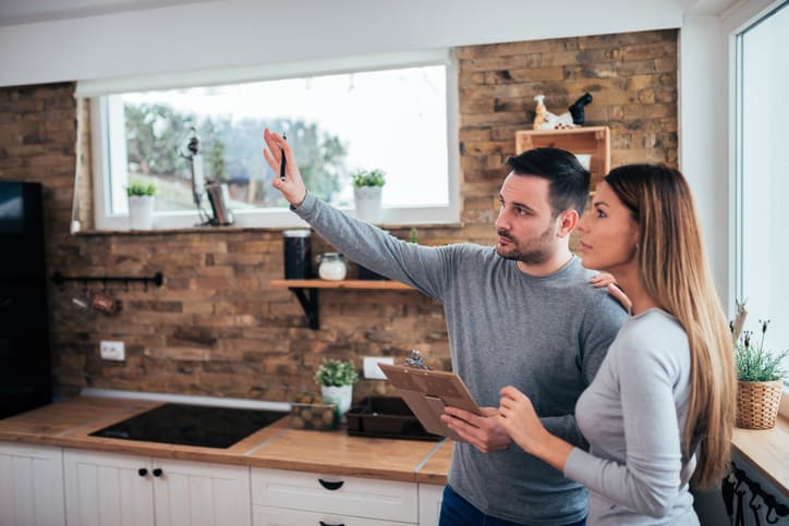 Couple talking about home renovation JM Kitchen & Bath Design